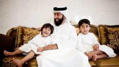 Sheikh Abdullah Mousa with his children at home.