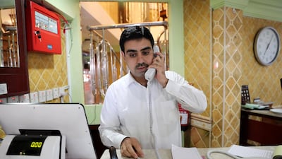 Abdul Ghani, a supervisor from Pakistan at the Al Ibrahimi restaurant in Abu Dhabi. 'Everyone is friendly here,' he says. Pawan Singh / The National