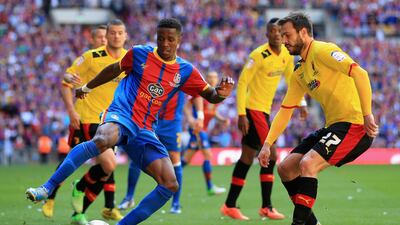 Wilfried Zaha, the Crystal Palace star, was well marked by Watford players as he was touted as the game-changer. Here, he takes on Marco Cassetti. Richard Heathcote / Getty Images