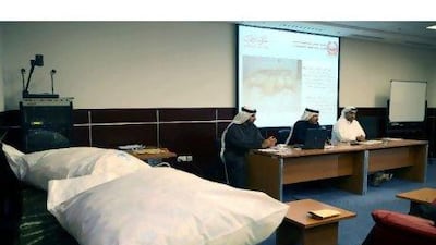 Two large bags of Captagon pills sit on a shelf at Dubai Police General Headquarters.