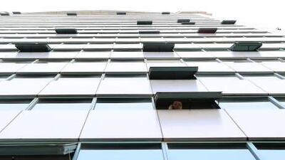 Safe building that have protective devices on Liwa street where Department of Municipal Affairs guidelines giving building owners in Abu Dhabi six months to install protective devices on residential windows to keep children and people with disabilities from falling in Abu Dhabi.