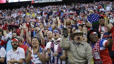 Fans of United States celebrate at the end a Copa America Centenario quarterfinal soccer match against Ecuador, Thursday, June 16, 2016 at CenturyLink Field in Seattle. United States won 2-1. (AP Photo/Elaine Thompson)