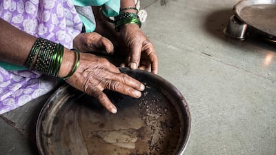 Now, the accumulated kohl is manually scraped off.