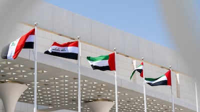The UAE and Iraqi flags displayed at the Presidential Airport