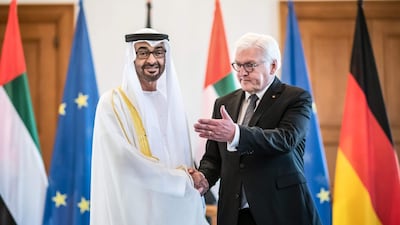 Sheikh Mohamed bin Zayed shakes hands with Mr. Steinmeier. AFP