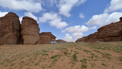 A car drives through the Sharaan Nature Reserve near the town of al-Ula in northwestern Saudi Arabia. AFP