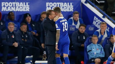 Leicester City manager Brendan Rodgers embraces James Maddison after the midfielder is substituted. Reuters
