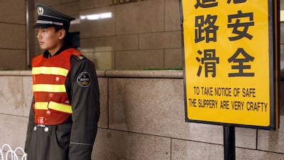 We don't speak Chinglish: idiosyncratically-translated signs such as this one at the entrance to a Beijing shopping mall will be a thing of the past. Peter Parks / AFP
