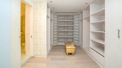 Plenty of space for clothes in a spacious walk-in wardrobe. Courtesy Allsopp & Allsopp
