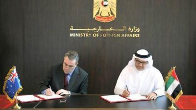 Dr Anwar Gargash, the Minister of State for Foreign Affairs, and Jim Williams, first assistant secretary of Australia, yesterday sign an agreement to jointly tackle human trafficking and people smuggling. Wam