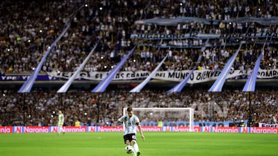 Argentina's Lionel Messi takes a freekick. Marcos Brindicci / Reuters