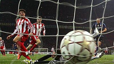 Mario Gomez, left, taps in the winner for Bayern Munich against Inter Milan.