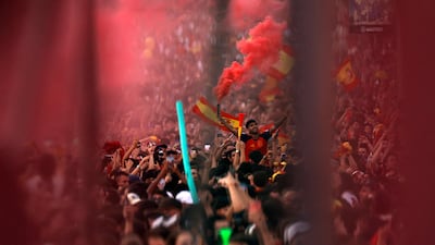 Fans at Cibeles Square gave Spain's players a heroes' welcome. AFP