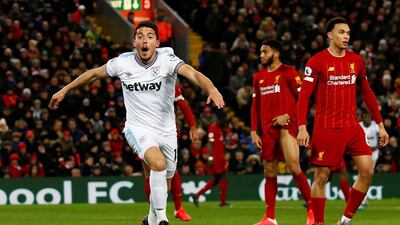 West Ham United's Pablo Fornals celebrates scoring their second goal as Liverpool's Trent Alexander-Arnold and Joe Gomez look on. Reuters