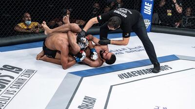 Abdullah Mohammad Ali Musalim has Omar Emad held in a triangle choke in the UAE Warriors 19 Arabia 3 at the Jiu-Jitsu Arena. Courtesy UAE Warriors