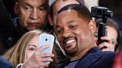 Smith poses with fans in Berlin. EPA.