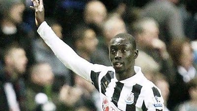 Newcastle United's Senegalese striker Papiss Cisse celebrates in the game against West Brom.