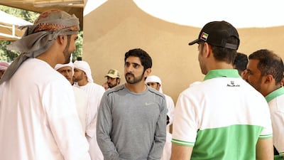 Sheikh Hamdan bin Mohammed speaks with participants of the 21st President of UAE Endurance Cup at the Emirates Endurance Village in Al Wathba, Abu Dhabi. Wam