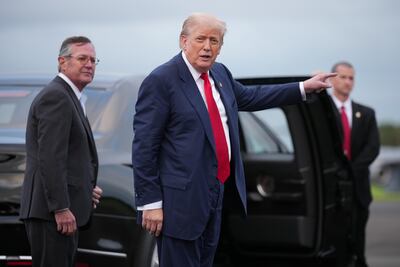 Ambassador Warren Stephens, left, with President Donald Trump during a trip to Scotland in July, has criticised the choice of Rolls-Royce to build a small nuclear reactor in North Wales. Getty Images