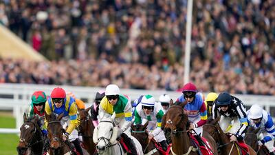 Runners turn away from the grandstand during The Ultima Handicap Chase. Getty