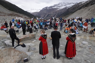 Climate activists held a rally near a shrinking glacier to campaign for a yes vote in the referendum. Getty