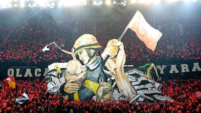 Soccer Football - Europa Conference League - Play-Off First Leg - Trabzonspor v Basel - Senol Gunes Spor Kompleksi Akyazi Stadyumu, Trabzon, Turkey - February 16, 2023 Trabzonspor fans display banners and Turkey flags for victims of an earthquake in Turkey and Syria inside the stadium before the match REUTERS / Stringer TPX IMAGES OF THE DAY