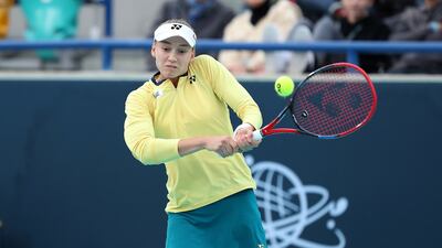 Elena Rybakina returns against Daria Kasatkina.