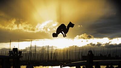 A competitor jumps in the water of the Geneva Lake during a water jump contest the first day of the International Roller Contest Lausanne (IRCL) in Lausanne Ouchy, Switzerland. Laurent Gillieron / EPA