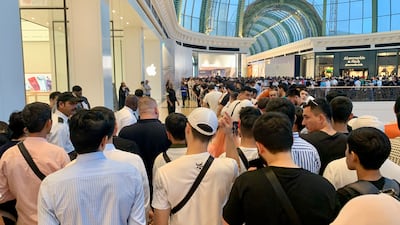 People queue for the iPhone 15 at Mall of the Emirates in Dubai. Pawan Singh / The National