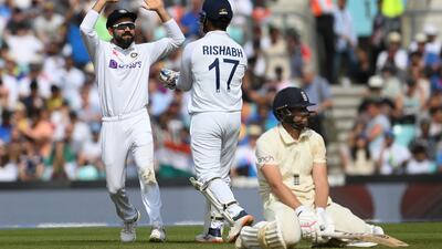 India captain Virat Kohli celebrates the run out of England batsman Dawid Malan on Day 5 of the fourth Test at The Oval on Monday, September 6. Getty