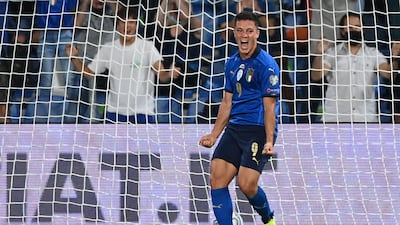 Italy's forward Giacomo Raspadori celebrates after scoring his team's second goal. AFP