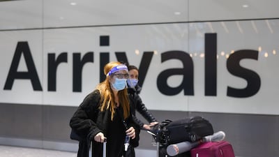 Travellers arrive at London Heathrow Airport in London, UK. Bloomberg