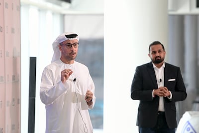 Salem Al Nuaimi, left, chairman of the board of Wio Bank, during the launch in Abu Dhabi. Khushnum Bhandari / The National
