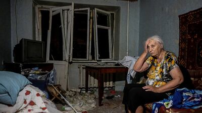 A wounded local resident in her destroyed flat in a block that was destroyed during Monday's Russian missile strike on Pokrovsk. Reuters