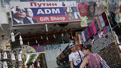 Russian tourists shop in the Old Market in the Red Sea resort town of Sharm El Sheikh, south Sinai, Egypt as thousands of tourists fly out of the Red Sea resort on November 9, 2015 after the crash of a Russian plane last week that killed all 224 passengers on board. Ahmed Abd el-Latif/AP Photo