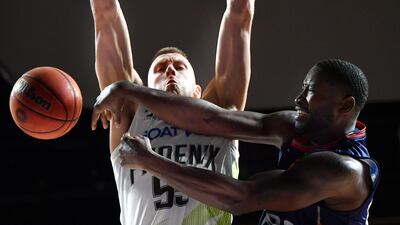 Adelaide 36ers' Donald Sloan and Mitch Creek of the South East Melbourne Phoenix battle for possession during the NBL match at Adelaide Entertainment Centre, on Wednesday, January 20. Getty