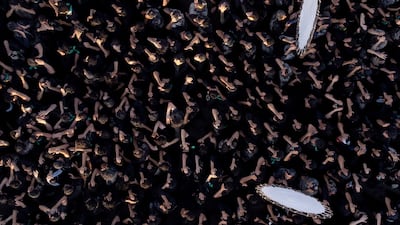 Shiite Muslim devotees march in a mourning procession in the 10-day period leading up to Ashura, in Nasiriyah in Iraq. AFP