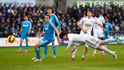 Centre midfield: Ki Sung-yueng, Swansea City. The underrated South Korean earned his side a point against Sunderland with a well-taken equaliser. (Photo: Stu Forster / Getty Images)