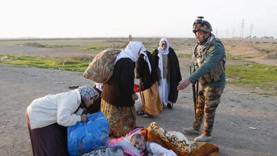 The released captives were met by Kurdish forces and officials. Ako Rasheed/Reuters
