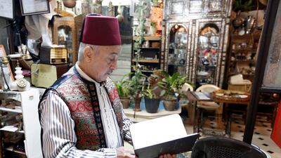 Haitham Tabbakhah, aged 62, inside his house, which he has turned into an antique museum in al-Qanawat neighbourhood in the old city of Damascus, Syria. EPA