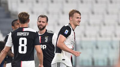 Juventus' Matthijs De Ligt (R) celebrates after scoring the fourth. EPA