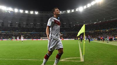 Mesut Ozil shown celebrating a goal for Germany during the 2014 World Cup in Brazil. Patrik Stollarz / AFP / June 30, 2014