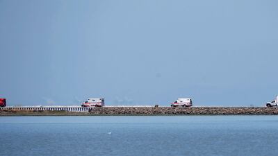 Ambulances and rescue vehicles rush to the scene of an Asiana Airlines Boeing 777 which crash landed at San Francisco International Airport. Reuters/Stephen Lam