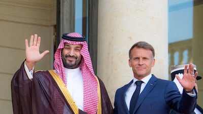 France's President Emmanuel Macron and Saudi Arabia's Crown Prince Mohammed bin Salman gesture at the Elysee Palace in Paris, France, August 24, 2026 Bandar Algaloud / Courtesy of Saudi Royal Court / Handout via REUTERS ATTENTION EDITORS - THIS PICTURE WAS PROVIDED BY A THIRD PARTY