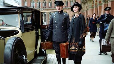 Laura Carmichael as Lady Edith in a scene from season four of Downton Abbey, one of the shows drawing people back to television. Nick Briggs / AP Photo