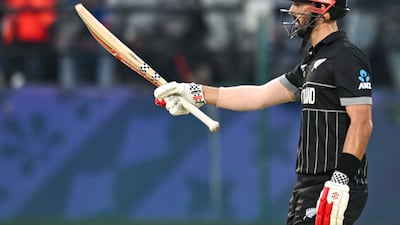 New Zealand's Daryl Mitchell celebrates after scoring a half-century. AFP