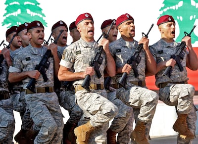 Lebanese soldiers take part in a military parade. AFP