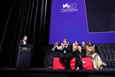 Pierangelo Buttafuoco, president of the Venice Film Festival, and jury members Maggie Gyllenhaal, Francesco Casetti, Daniel Blumberg, Shahrbanoo Sadat, Xavier Giannoli and Kaouther Ben Hania, during the closing ceremony. Getty Images