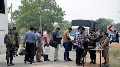 Sri Lankan army personnel search people and their bags at a check point in the village of Kattankudy in Batticaloa, Sri Lanka April 28, 2019. Reuters