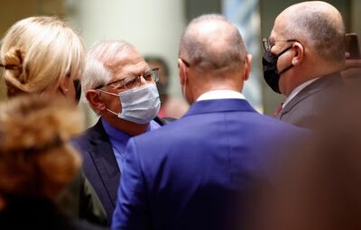 EU foreign policy chief Josep Borrell, centre, speaks with Croatia's Foreign Minister Gordan Grlic Radman and Portugal's Foreign Minister Augusto Santos Silva during a meeting of EU foreign ministers at the European Council building in Brussels this week. AFP